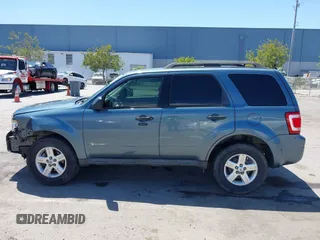 2011 Ford Escape Hybrid with VIN 1FMCU4K30BKC54584, listed as a IAAI auction lot 42131257 with 107,905 mi miles and . Bid and sale history available at DreamBid. Image 14.