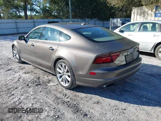 2016 Audi A7 3.0 Premium Plus with VIN WAUWGAFC2GN105498, listed as a IAAI auction lot 41488062 with 120,393 mi miles. Bid and sale history available at carsss.com. Image 3.