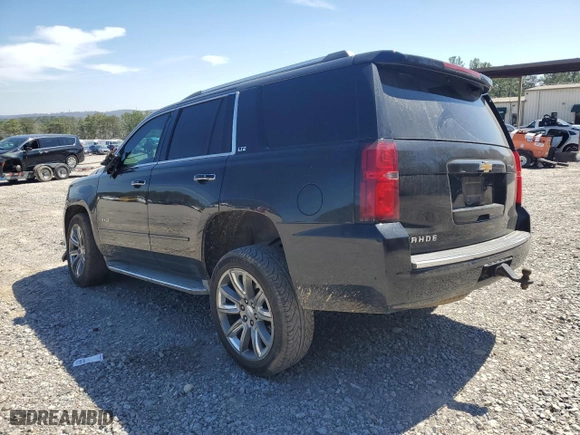2015 Chevrolet Tahoe LTZ with VIN 1GNSKCKC5FR179790, listed as a Copart auction lot 49684775 with 157,117 mi miles and Salvage Title. Bid and sale history available at carsss.com. Image 2.