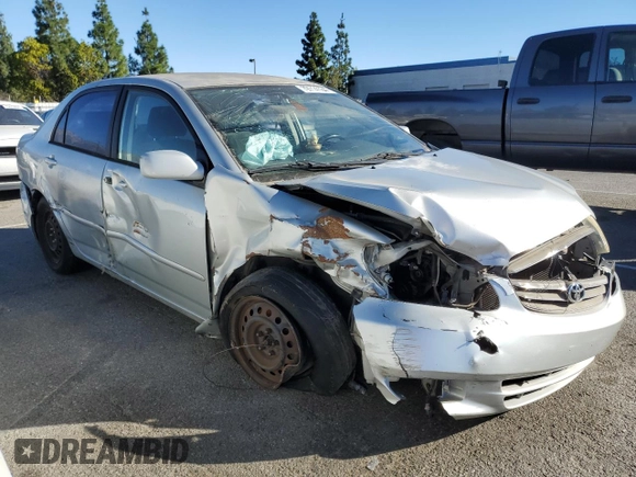 2003 Toyota Corolla CE with VIN 1NXBR32E13Z155142, listed as a Copart auction lot 79714184 with 299,999 mi miles and Salvage Title. Bid and sale history available at DreamBid. Image 4.