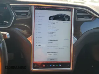 2016 Tesla Model S 90D with VIN 5YJSA1E2XGF129106, listed as a Copart auction lot 59162185 with 136,004 mi miles and Salvage title. Bid and sale history available at DreamBid. Image 9.