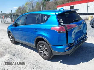 2018 Toyota RAV4 LE with VIN JTMZFREV4JJ734702, listed as a IAAI auction lot 41987540 with 141,526 mi miles. Bid and sale history available at carsss.com. Image 3.
