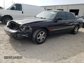 2004 Ford Crown Victoria LX z VIN 2FAFP74W44X120698, wystawiony jako Copart lot #60204835 z przebiegiem 132 811 mil mil oraz Szkoda całkowita • Salvage title. Historia ofert i sprzedaży dostępna na DreamBid. Obrazek 1.