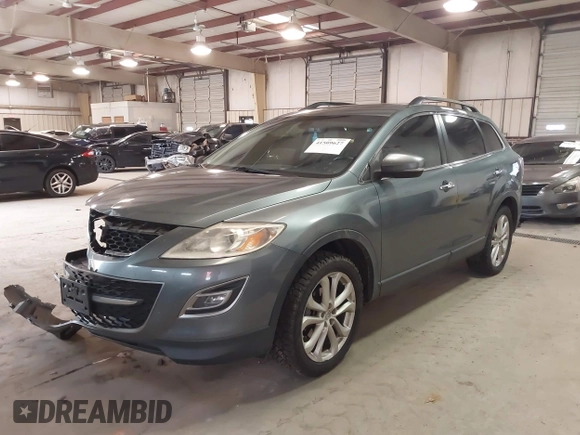 2012 Mazda CX-9 Grand Touring with VIN JM3TB3DV6C0360304, listed as a IAAI auction lot 41509627 with 163,986 mi miles. Bid and sale history available at carsss.com. Image 17.