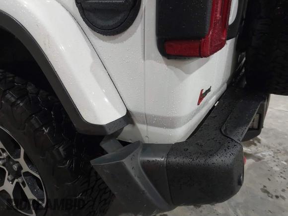 2021 Jeep Wrangler Unlimited Rubicon with VIN 1C4HJXFN2MW809904, listed as a IAAI auction lot 41567956 with 34,000 mi miles and . Bid and sale history available at DreamBid. Image 17.
