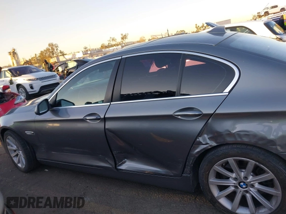2014 BMW 5 Series 535i with VIN WBA5B1C54ED479873, listed as a IAAI auction lot 41338061 with 75,097 mi miles and . Bid and sale history available at DreamBid. Image 14.