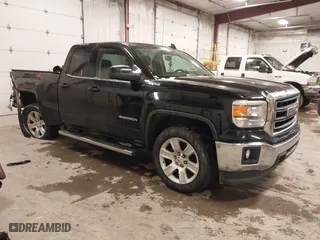 2015 GMC Sierra 1500 SLE with VIN 1GTV2UEC5FZ397770, listed as a IAAI auction lot 41295955 with 140,519 mi miles. Bid and sale history available at carsss.com. Image 1.