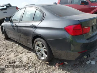 2015 BMW 3 Series 328i with VIN WBA3A5G55FNS90446, listed as a IAAI auction lot 41828658 with 124,867 mi miles. Bid and sale history available at carsss.com. Image 3.