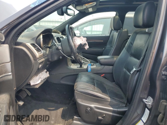 2014 Jeep Grand Cherokee Limited with VIN 1C4RJFBM1EC352484, listed as a Copart auction lot 57983305 with 157,143 mi miles and Salvage title. Bid and sale history available at DreamBid. Image 7.