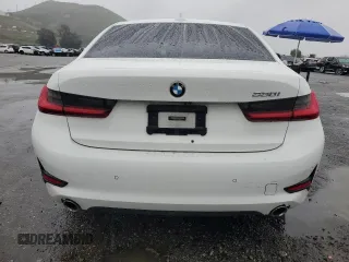 2021 BMW 3 Series 330i with VIN 3MW5R1J0XM8B48990, listed as a Copart auction lot 49277185 with 69,776 mi miles and Salvage Title. Bid and sale history available at carsss.com. Image 6.