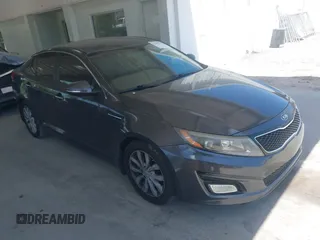 2015 Kia Optima EX z VIN 5XXGN4A7XFG497858, wystawiony jako IAAI lot #42156724 z przebiegiem 109 028 mil mil oraz . Historia ofert i sprzedaży dostępna na DreamBid. Obrazek 1.