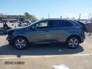 2019 Ford Edge SEL z VIN 2FMPK3J92KBC63577, wystawiony jako IAAI lot #41948953 z przebiegiem 72 551 mil mil oraz . Historia ofert i sprzedaży dostępna na DreamBid. Obrazek 15.