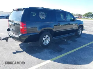 2011 Chevrolet Suburban LS with VIN 1GNSCHE04BR284777, listed as a IAAI auction lot 41291991 with 285,187 mi miles. Bid and sale history available at carsss.com. Image 4.