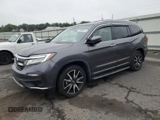 2019 Honda Pilot Touring 7-Passenger z VIN 5FNYF6H64KB033424, wystawiony jako Copart lot #60892015 z przebiegiem 62 175 mil mil oraz Szkoda całkowita • Salvage title. Historia ofert i sprzedaży dostępna na DreamBid. Obrazek 1.