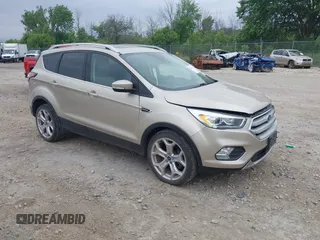 2018 Ford Escape Titanium with VIN 1FMCU9J94JUA44964, listed as a IAAI auction lot 42494471 with 100,955 mi miles and . Bid and sale history available at DreamBid. Image 1.
