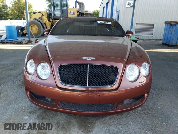 2007 Bentley Continental GT with VIN SCBDR33W77C047935, listed as a Copart auction lot 60557985 with 61,661 mi miles and Salvage title. Bid and sale history available at DreamBid. Image 5.