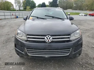 2014 Volkswagen Touareg Lux with VIN WVGEF9BP5ED005175, listed as a Copart auction lot 51815565 with 163,183 mi miles and Clean Title. Bid and sale history available at DreamBid. Image 5.
