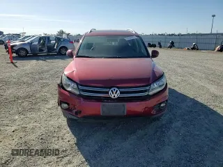 2013 Volkswagen Tiguan SE with VIN WVGBV7AX9DW012368, listed as a Copart auction lot 57244975 with 177,810 mi miles and Salvage title. Bid and sale history available at DreamBid. Image 14.