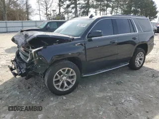 2017 GMC Yukon SLT with VIN 1GKS1BKC6HR193114, listed as a Copart auction lot 42927465 with 98,818 mi miles and Salvage Title. Bid and sale history available at carsss.com. Image 1.