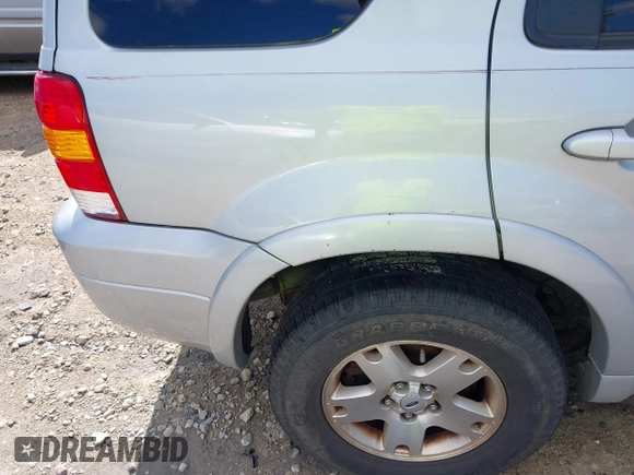 2006 Ford Escape Limited with VIN 1FMCU94106KC25620, listed as a IAAI auction lot 42739804 with 104,142 mi miles and . Bid and sale history available at DreamBid. Image 6.