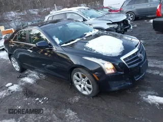 2013 Cadillac ATS z VIN 1G6AA5RA4D0113503, wystawiony jako IAAI lot #41599916 z przebiegiem 156 011 mil mil oraz . Historia ofert i sprzedaży dostępna na DreamBid. Obrazek 1.