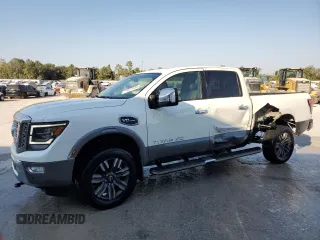 2023 Nissan Titan XD PRO-4X with VIN 1N6AA1FB1PN109108, listed as a Copart auction lot 71021034 with 15,828 mi miles and Salvage Title. Bid and sale history available at carsss.com. Image 1.