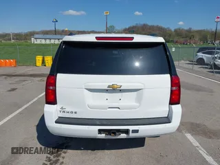 2015 Chevrolet Tahoe LT with VIN 1GNSCBKCXFR552071, listed as a IAAI auction lot 41972157 with 214,738 mi miles and . Bid and sale history available at DreamBid. Image 16.