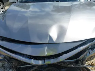2018 Toyota Camry LE with VIN 4T1B11HK2JU578575, listed as a IAAI auction lot 41850389 with 213,235 mi miles. Bid and sale history available at carsss.com. Image 10.