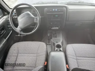 1999 Jeep Cherokee Sport with VIN 1J4FF68S6XL602177, listed as a Copart auction lot 51962355 with 176,386 mi miles and Salvage Title. Bid and sale history available at carsss.com. Image 8.