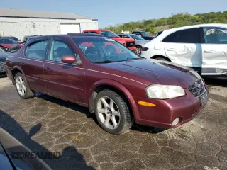 2001 Nissan Maxima SE 20th Anniversary. z VIN JN1CA31A31T314926, wystawiony jako Copart lot #69869354 z przebiegiem Nie podano mil oraz Szkoda całkowita • Salvage title. Historia ofert i sprzedaży dostępna na DreamBid. Obrazek 4.