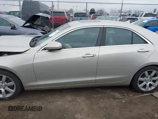 2013 Cadillac ATS z VIN 1G6AA5RA5D0131069, wystawiony jako IAAI lot #41708927 z przebiegiem 166 624 mil mil oraz . Historia ofert i sprzedaży dostępna na DreamBid. Obrazek 14.