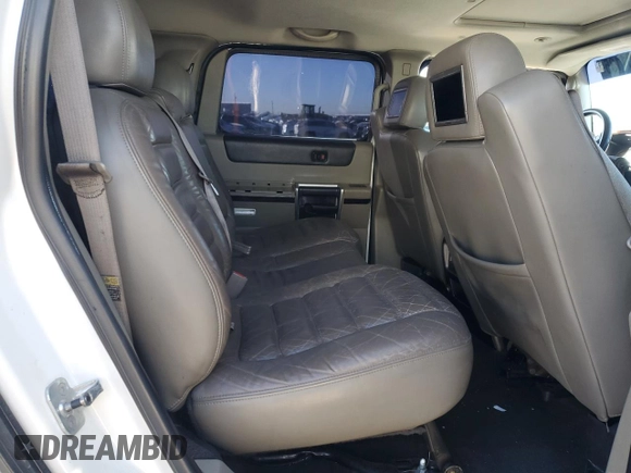 2004 Hummer H2 with VIN 5GRGN23U64H121213, listed as a Copart auction lot 42001135 with 0 mi miles and Salvage Title. Bid and sale history available at carsss.com. Image 10.