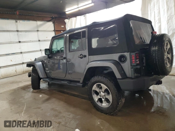 2018 Jeep Wrangler JK Unlimited Sahara with VIN 1C4HJWEG2JL848115, listed as a Copart auction lot 80292624 with 72,591 mi miles and Salvage Title. Bid and sale history available at carsss.com. Image 2.