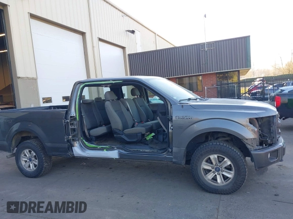 2015 Ford F-150 XLT with VIN 1FTEX1E88FKF22622, listed as a IAAI auction lot 41402747 with 214,667 mi miles. Bid and sale history available at carsss.com. Image 14.