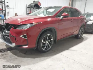 2017 Lexus RX with VIN 2T2BZMCA6HC112857, listed as a IAAI auction lot 41614059 with 100857 miles. Bid and sale history available at carsss.com. Image 18.