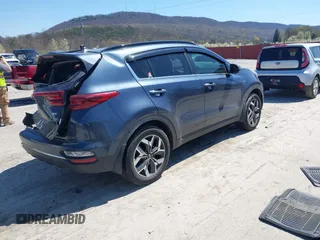 2020 Kia Sportage EX with VIN KNDPNCAC3L7752538, listed as a IAAI auction lot 42060920 with 68,740 mi miles and . Bid and sale history available at DreamBid. Image 4.