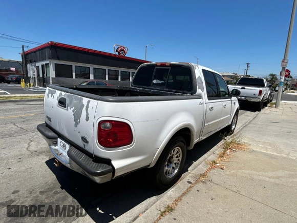 2001 Ford F-150 XLT с VIN 1FTRW07L11KF90642, выставлен на аукционе Copart как лот 64489205 с пробегом 242 959 миль миль и Списание • Salvage title. История ставок и продаж доступна на DreamBid. Изображение 4.
