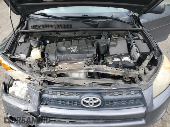 2010 Toyota RAV4 Sport with VIN JTMRF4DV2A5025473, listed as a Copart auction lot 57170405 with 171,006 mi miles and Salvage title. Bid and sale history available at DreamBid. Image 12.
