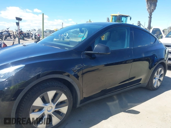 2020 Tesla Model Y Long Range with VIN 5YJYGDEE2LF059177, listed as a IAAI auction lot 41916260 with 66,190 mi miles and . Bid and sale history available at DreamBid. Image 14.