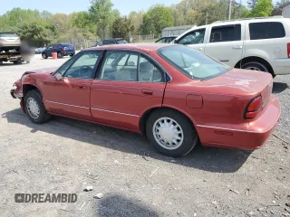 1998 Oldsmobile 88 LS z VIN 1G3HN52K2W4809677, wystawiony jako Copart lot #54331535 z przebiegiem 99 587 mil mil oraz Szkody całkowita. Historia ofert i sprzedaży dostępna na DreamBid. Obrazek 2.