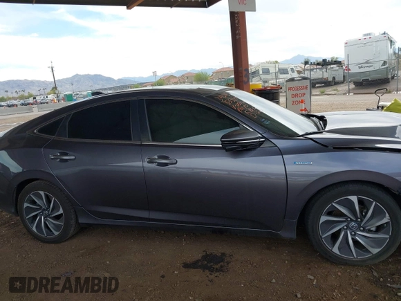 2020 Honda Insight Touring with VIN 19XZE4F94LE007115, listed as a IAAI auction lot 41819370 with 53,774 mi miles and . Bid and sale history available at carsss.com. Image 13.