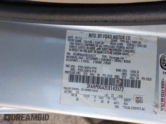 2012 Ford Fusion S with VIN 3FAHP0GA2CR143572, listed as a IAAI auction lot 41826526 with 199,083 mi miles. Bid and sale history available at carsss.com. Image 9.