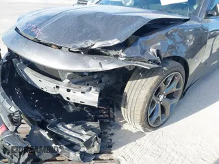 2015 Dodge Charger RT with VIN 2C3CDXCT9FH819971, listed as a IAAI auction lot 40592010 with 154,386 mi miles and . Bid and sale history available at DreamBid. Image 6.