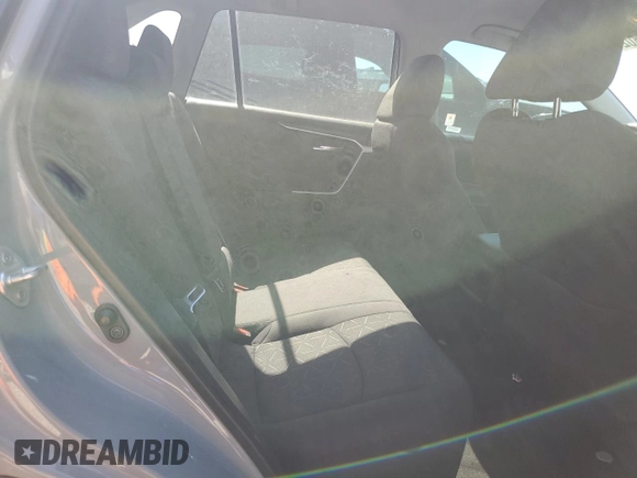 2021 Toyota RAV4 XLE with VIN 2T3W1RFV4MW134798, listed as a Copart auction lot 58802435 with 74,495 mi miles and Salvage title. Bid and sale history available at DreamBid. Image 11.