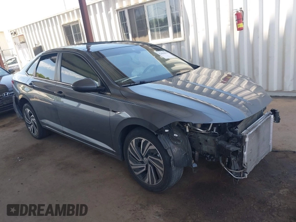 2021 Volkswagen Jetta SEL z VIN 3VWE57BU3MM032442, wystawiony jako IAAI lot #42404802 z przebiegiem 32 927 mil mil oraz . Historia ofert i sprzedaży dostępna na DreamBid. Obrazek 1.