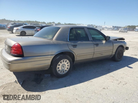 2003 Ford Police Interceptor Street Appear z VIN 2FAFP71W03X104811, wystawiony jako Copart lot #49307995 z przebiegiem 242 937 mil mil oraz Szkoda całkowita • Salvage title. Historia ofert i sprzedaży dostępna na DreamBid. Obrazek 3.