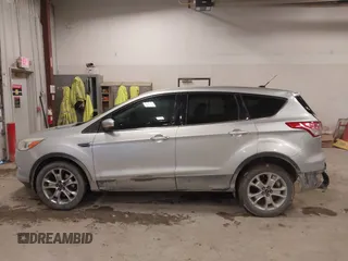 2013 Ford Escape SEL with VIN 1FMCU0H98DUC72150, listed as a IAAI auction lot 41213748 with 136,323 mi miles. Bid and sale history available at carsss.com. Image 13.