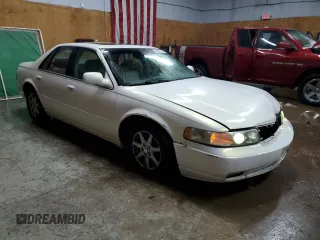 2004 Cadillac Seville Luxury SLS z VIN 1G6KS54Y24U168062, wystawiony jako Copart lot #84865574 z przebiegiem 240 052 mil mil oraz Tytuł czysty. Historia ofert i sprzedaży dostępna na DreamBid. Obrazek 4.