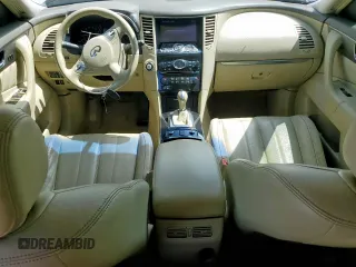 2014 Infiniti QX70 z VIN JN8CS1MU7EM450565, wystawiony jako Copart lot #55931325 z przebiegiem 159 813 mil mil oraz Szkody całkowita. Historia ofert i sprzedaży dostępna na DreamBid. Obrazek 8.