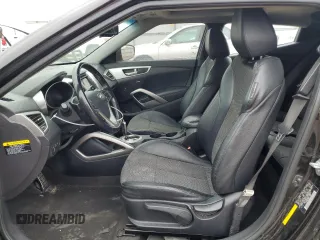 2014 Hyundai Veloster z VIN KMHTC6AD0EU188863, wystawiony jako Copart lot #54750925 z przebiegiem 96 212 mil mil oraz Szkoda całkowita • Salvage title. Historia ofert i sprzedaży dostępna na DreamBid. Obrazek 7.